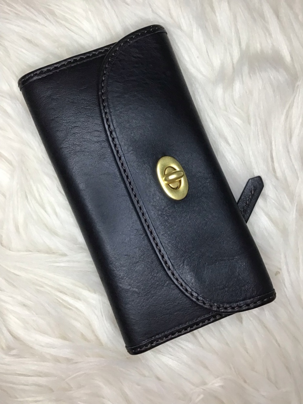 Dooney Florentine black leather turnlock wallet